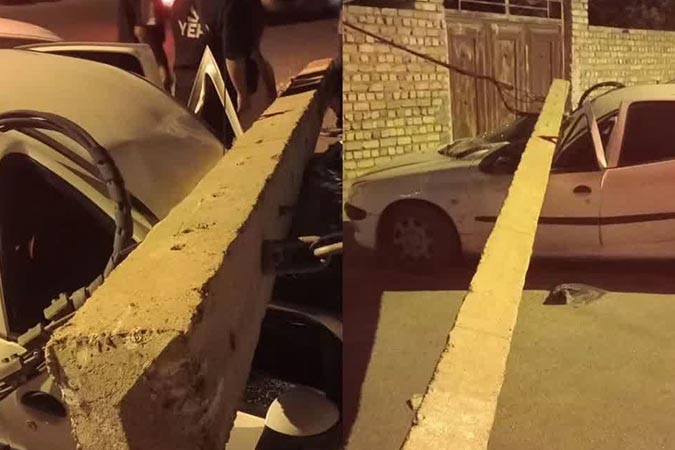 تصادف خودرو با تیر برق در پشت باغ فین؛ سقوط پایه برق روی خودروی پارکشده
